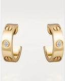 Cartier small earrings gold diamonds